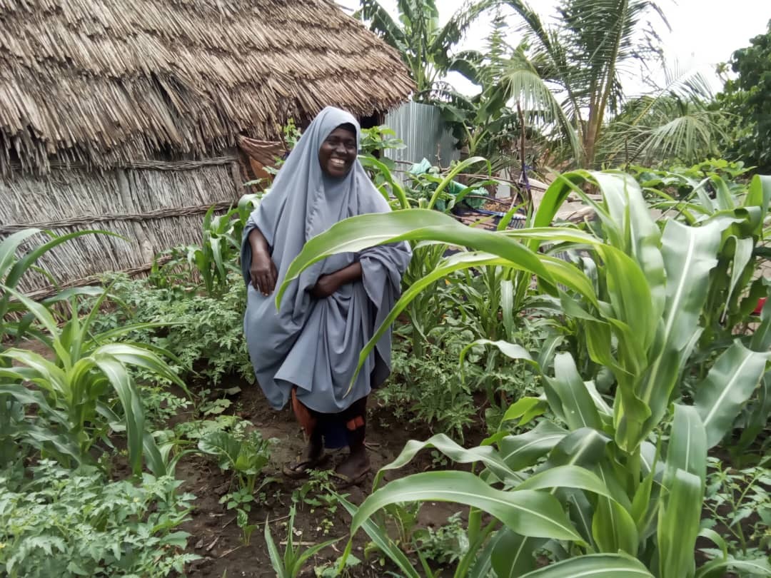 Woman smiling in field