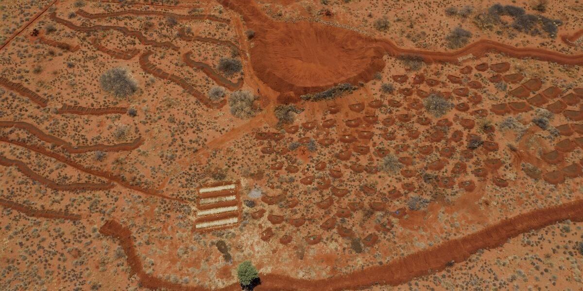 Aerial photo of farm with half moon berms.